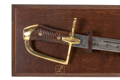 Polish war saber Ludwikówka wz 34 without scabbard on a hanging table - replica