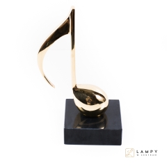 Brass statuette TONE on a marble base