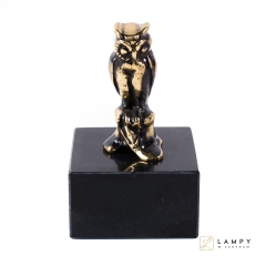 Owl on a marble base, Brass