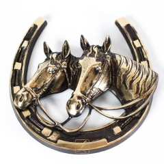 Brass horseshoe with a pair of horses Brass