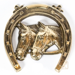 Brass horseshoe with a pair of horses Brass No. 43