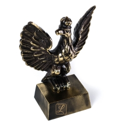 Eagle with a crown on a rectangular pedestal. Brass