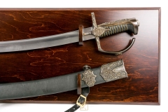 An ornate Polish Hussar tempered sabre with scabbard 17th century, complete with hanging tabloid.