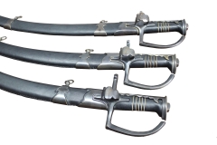 Polish hardened saber Husaria with a scabbard, 17th century. Three versions of the finish