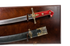 A beautiful, hardened noble carabel with a leather sheath on a hanging table