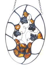 Oval stained glass window with amber leaves W6