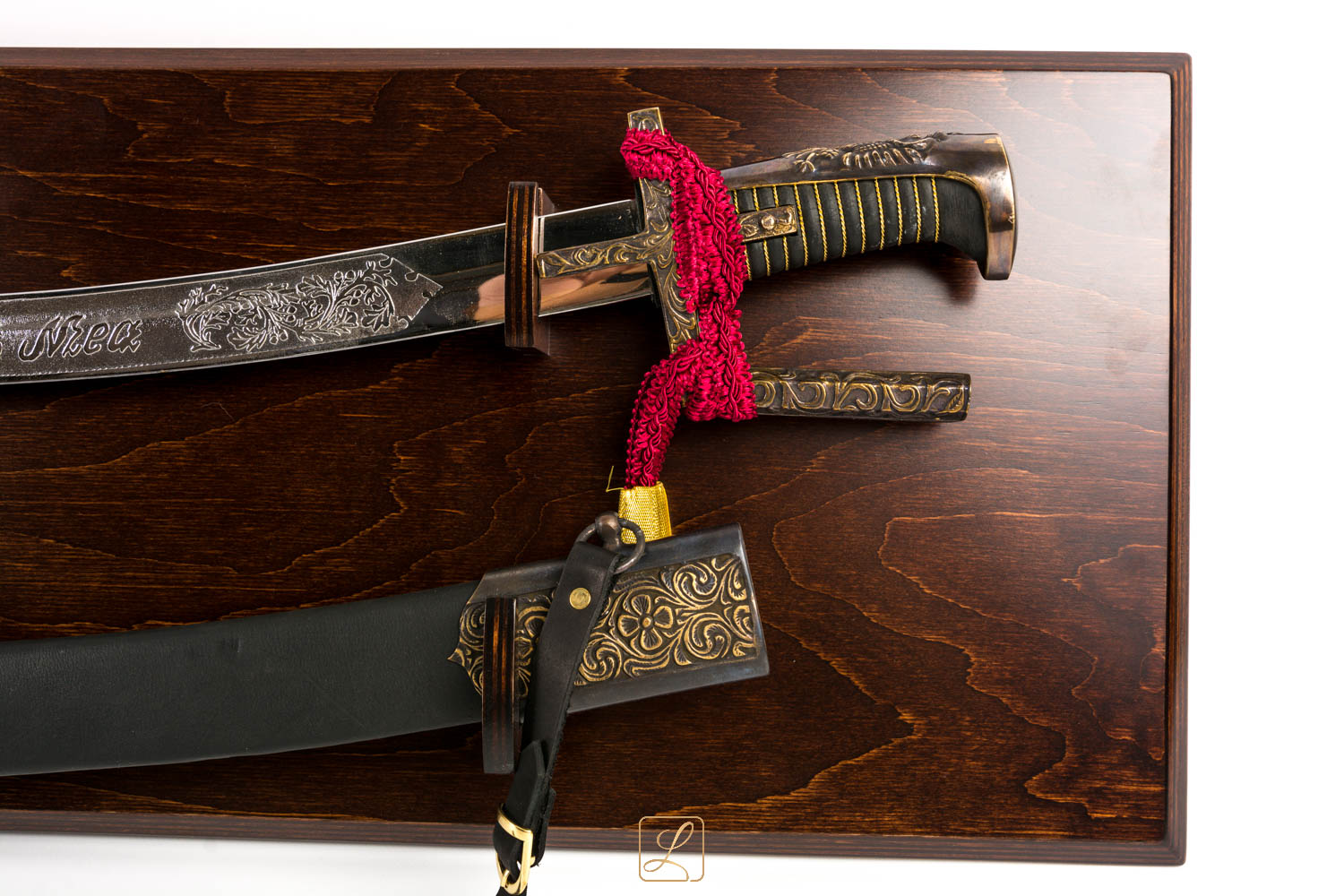 Polish Hussar saber from the first half 17th century, chrome version with scabbard on a hanging table - replica